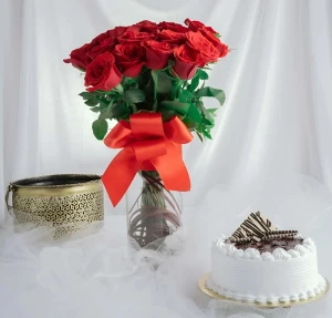 Roses In A Vase And Cake